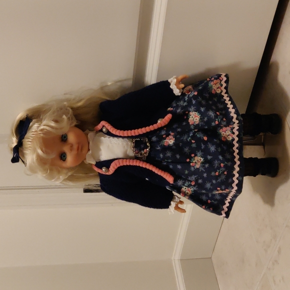 With tag! Made in Germany Engel Buppe doll with a stand